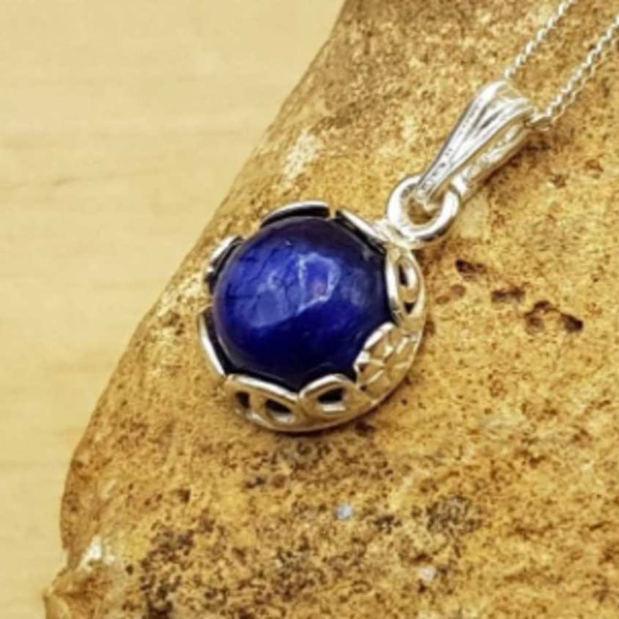 Floral Tiny sapphire pendant necklace. September birthstone
