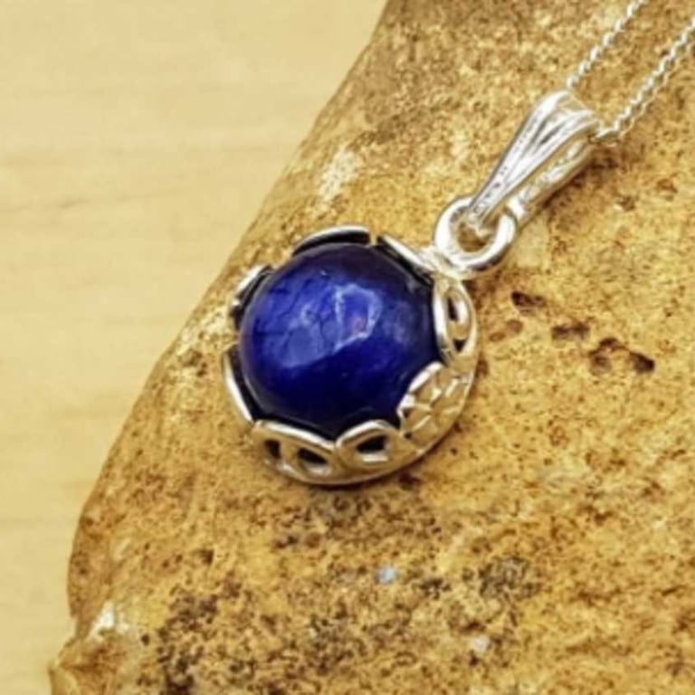 Floral Tiny sapphire pendant necklace. September birthstone