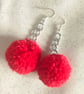 Red pom pom dangle earrings 