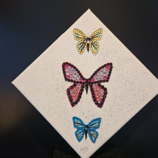 A trio of butterflies. 