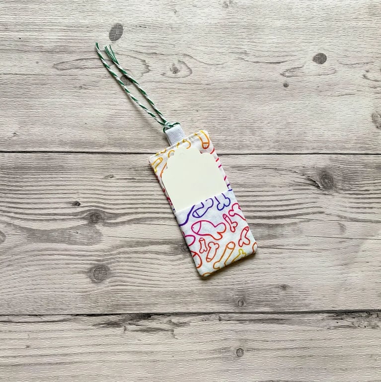 Fun willy themed fabric gift tags with card. Reusable.