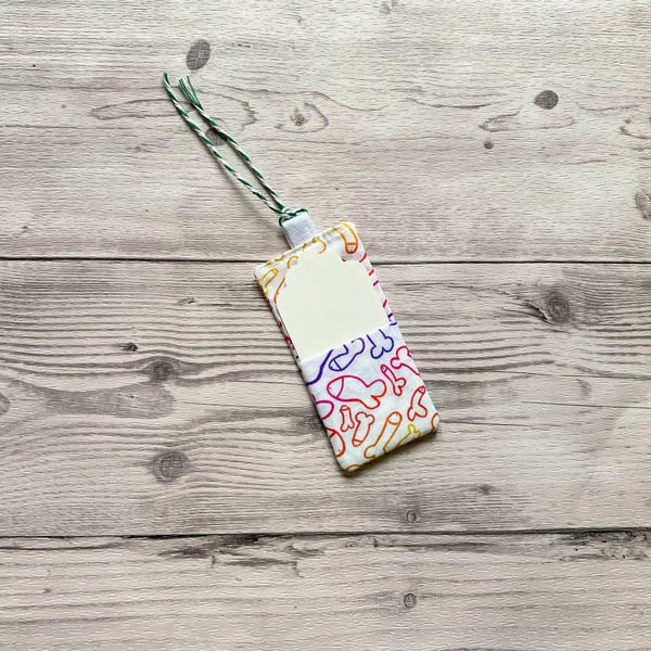 Fun willy themed fabric gift tags with card. Reusable.