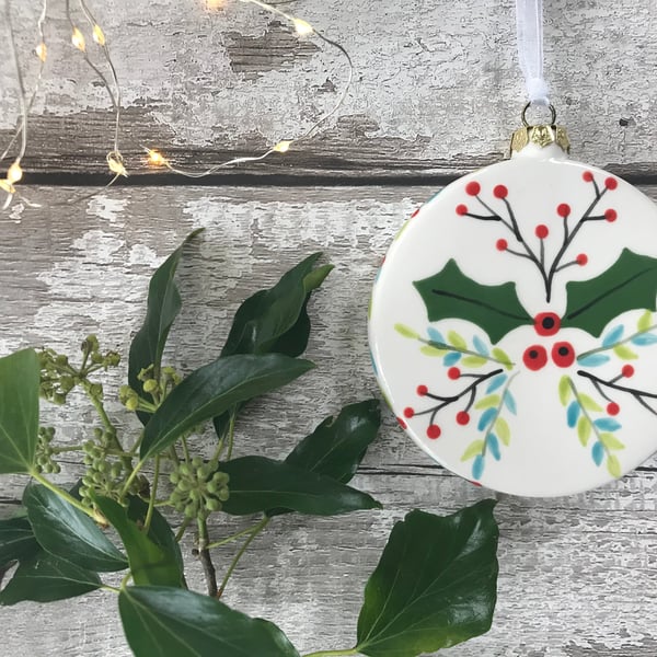Hand painted flat Christmas Bauble with Holly and Berries design