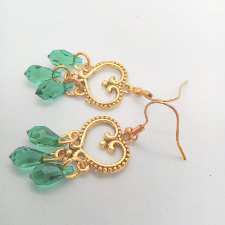 Earrings made with Green Crystal Beads and a Gold Chandelier Connector