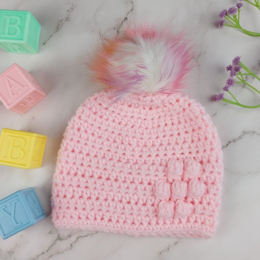 Pink Crochet Baby Hat Newborn to 3 Months with Bobble Flower and Rainbow Pom