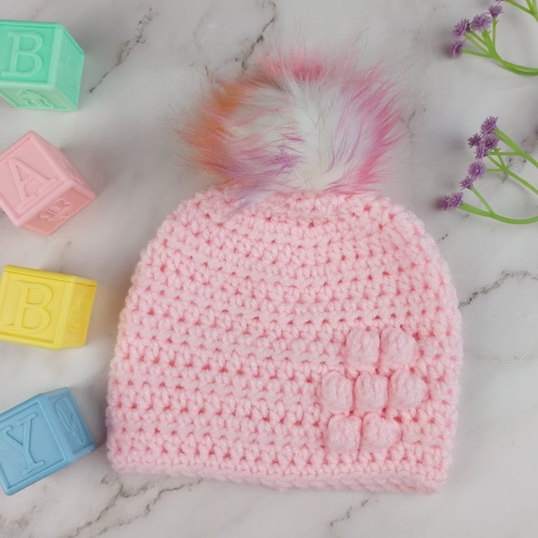 Pink Crochet Baby Hat Newborn to 3 Months with Bobble Flower and Rainbow Pom