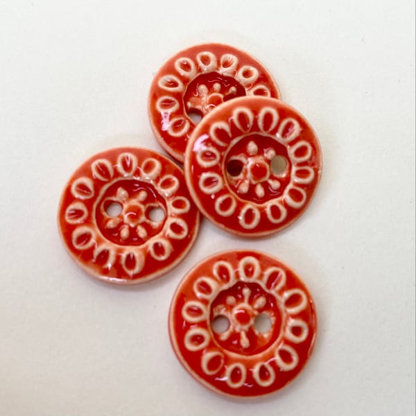 Set of four handmade ceramic buttons dark orange