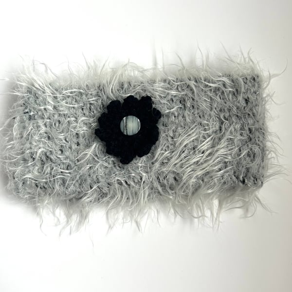 Headband earwarmer hand knitted in grey with black flower detail 