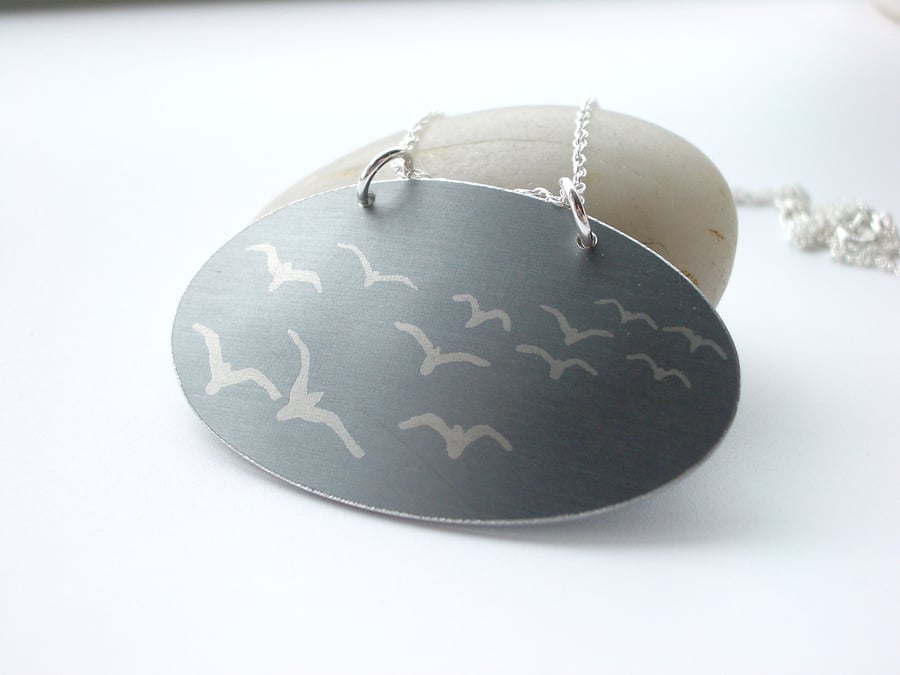 Seagull pendant in grey and silver