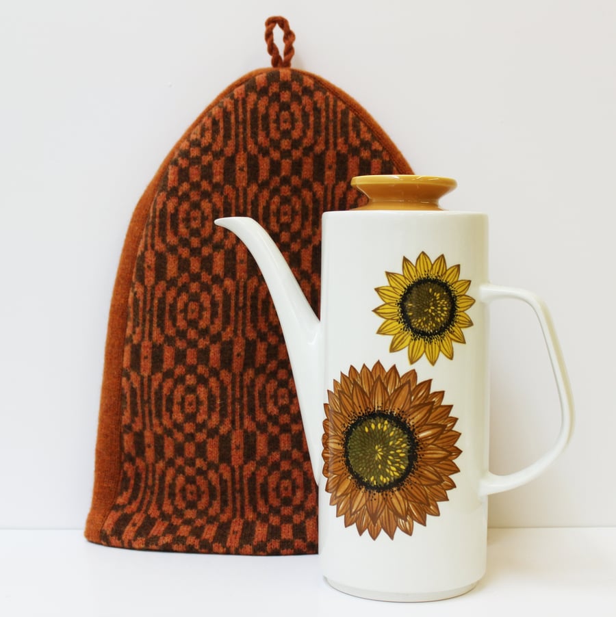 Tapestry design cafetiere cover in dark orange
