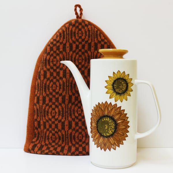 Tapestry design cafetiere cover in dark orange