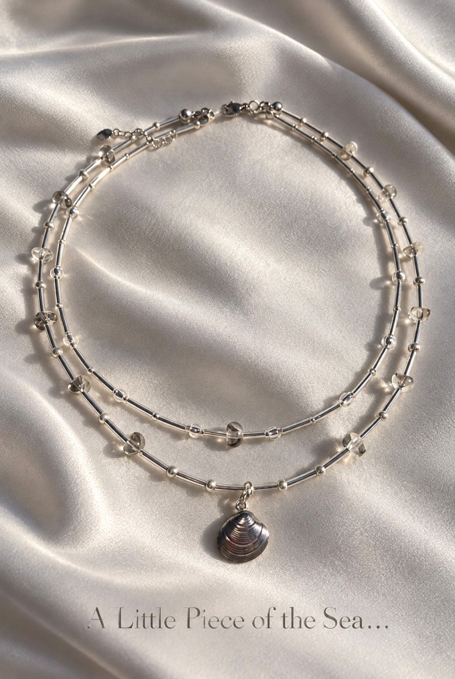 Silver-Tone Double Strand Necklace with Clear Glass Beads and Shell Pendant