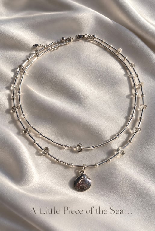 Silver-Tone Double Strand Necklace with Clear Glass Beads and Shell Pendant