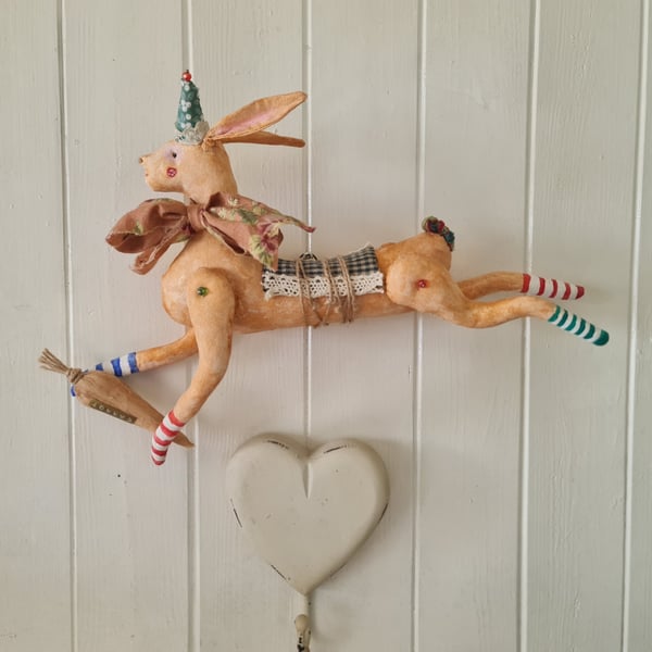 Wall mounted leaping hare with carrot textile art
