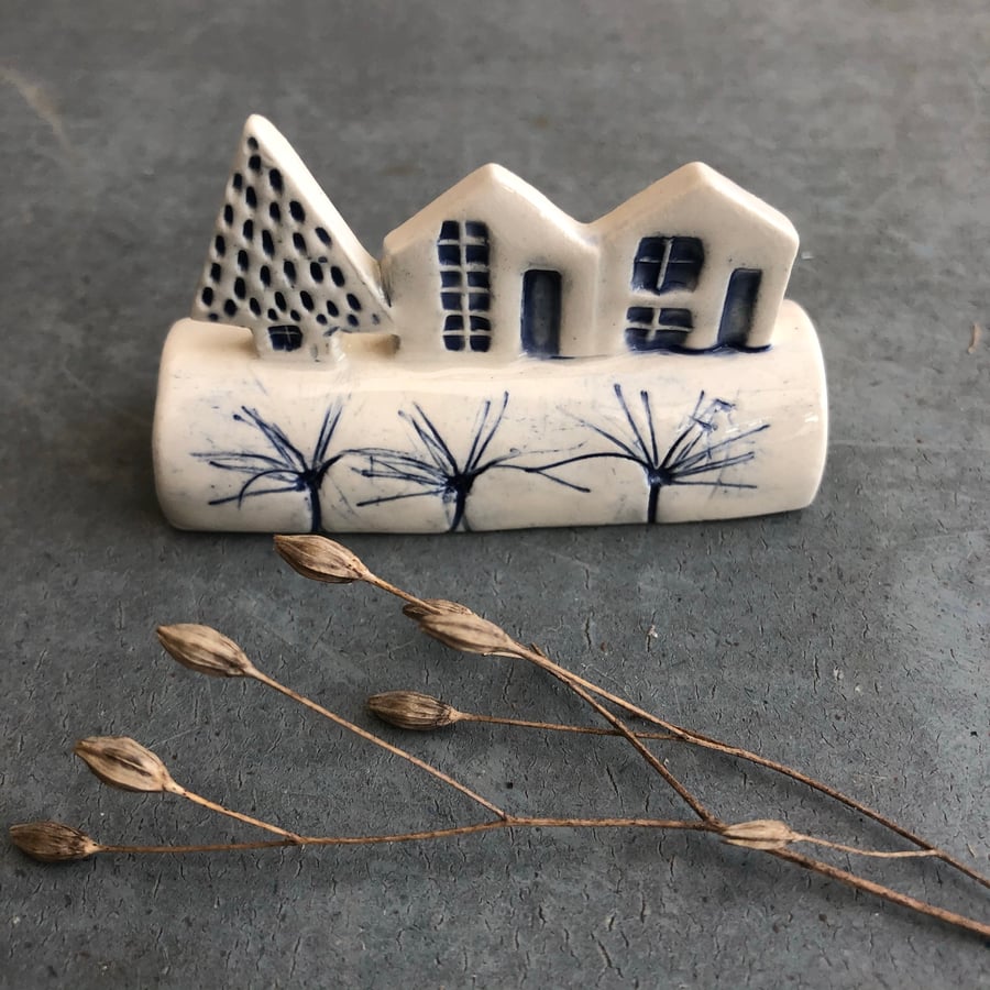 Ceramic row of little houses. 