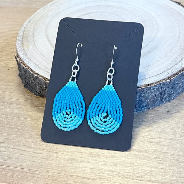 Colourful teardrop earrings in bright blue tones