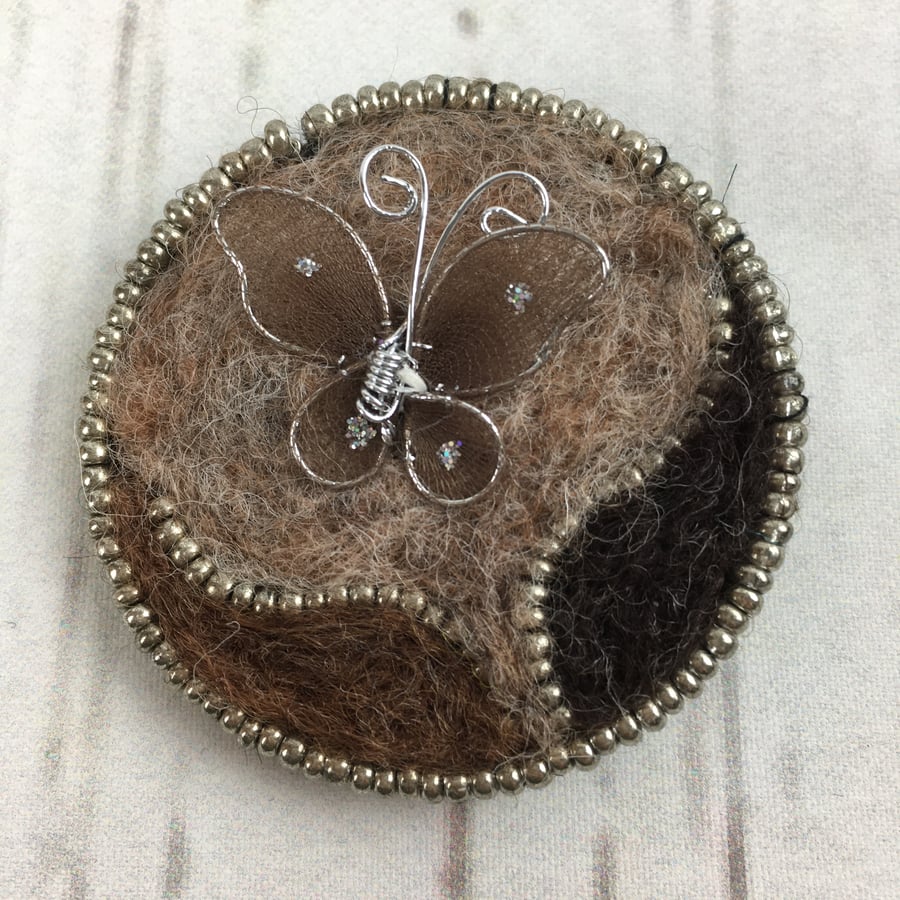 Butterfly brooch, needle felted in brown with silver beading