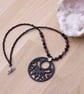 Black butterfly necklace with black and purple beads - Image 4