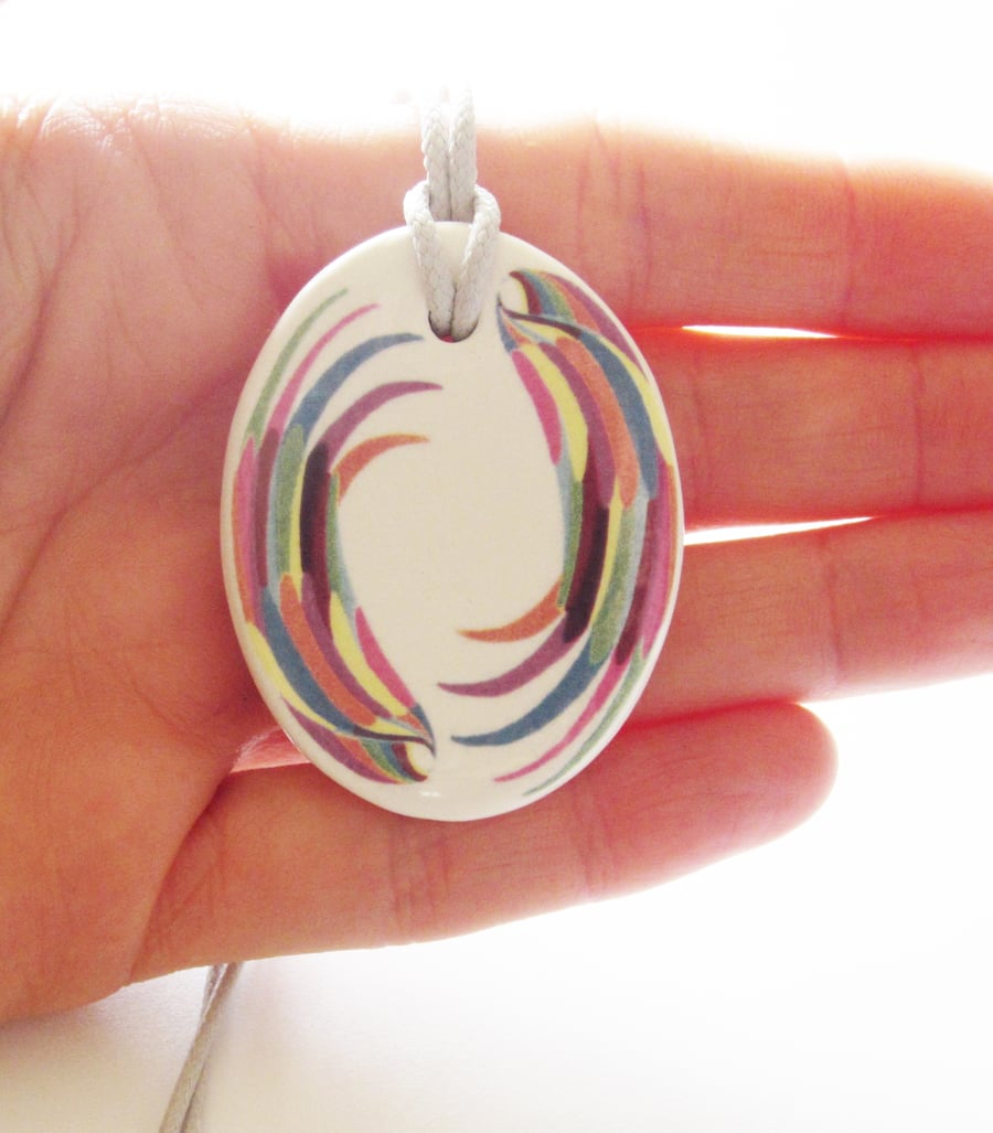 Multicolour Wing Design Oval Ceramic Pendant on Grey Cord with Lobster Clasp