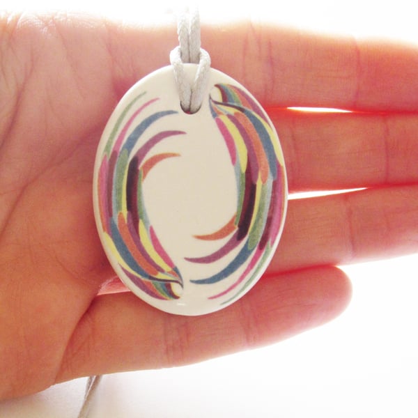 Multicolour Wing Design Oval Ceramic Pendant on Grey Cord with Lobster Clasp