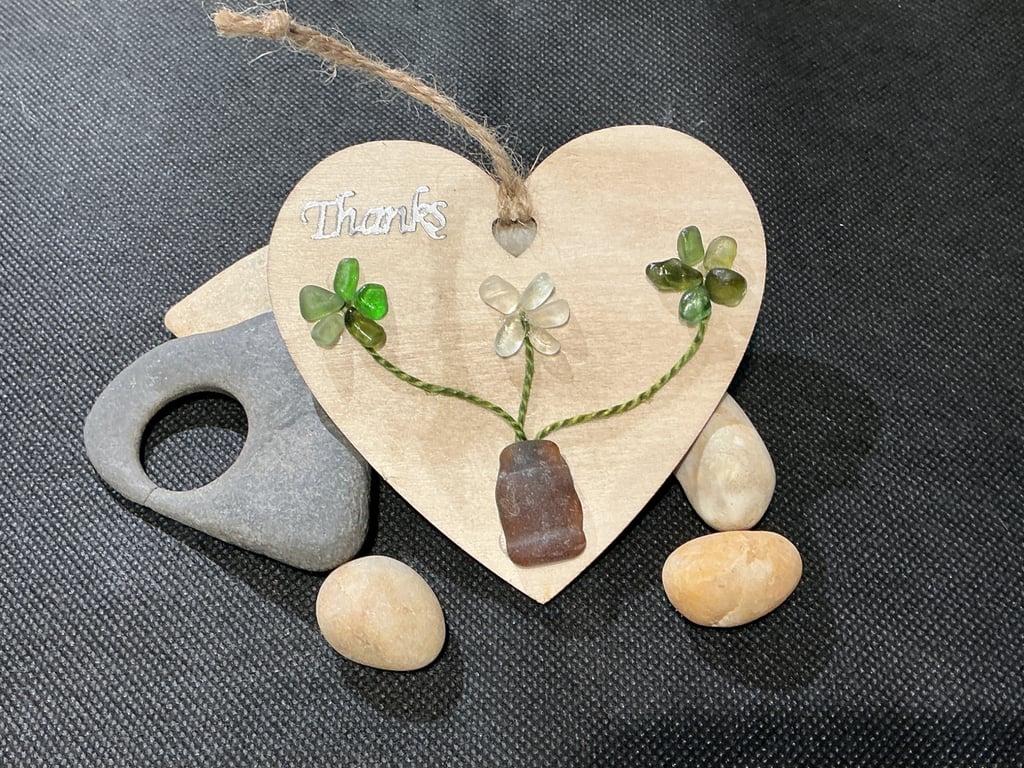 Wooden heart with 'thanks' sentiment  with sea glass flowers.