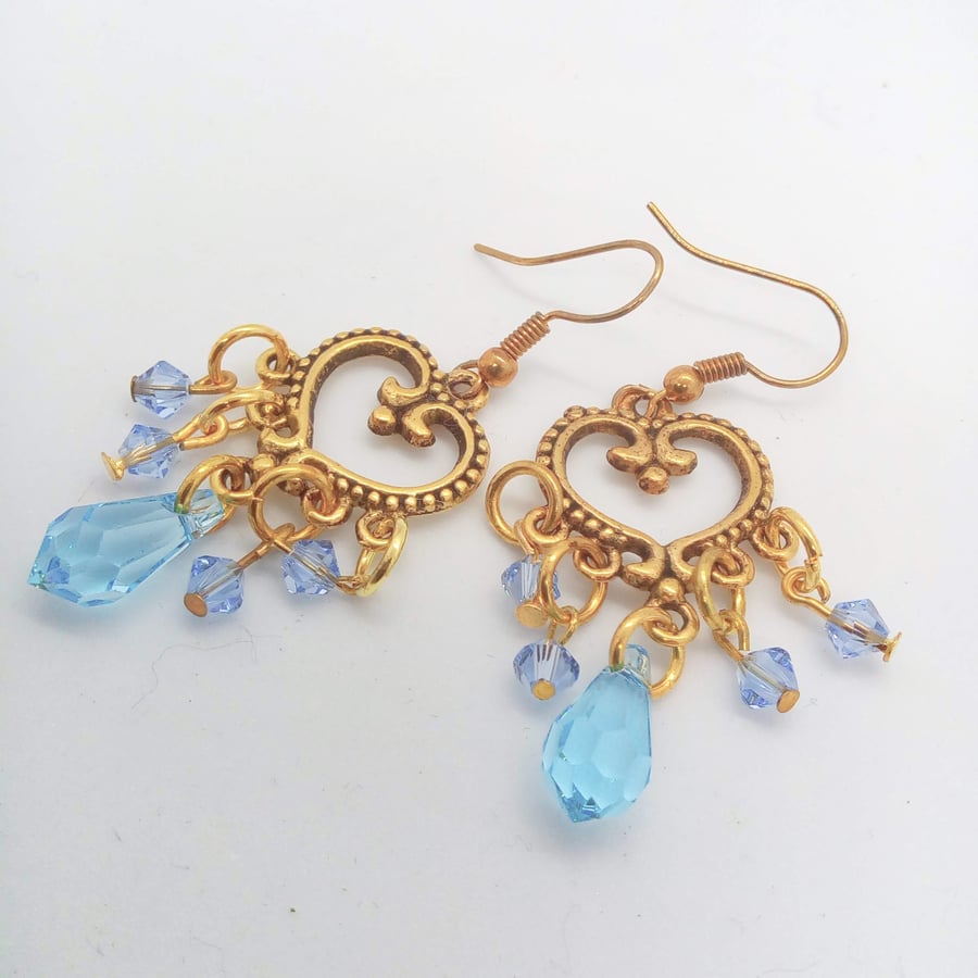 Earrings made with Blue Crystal Beads and a Gold Chandelier Connector