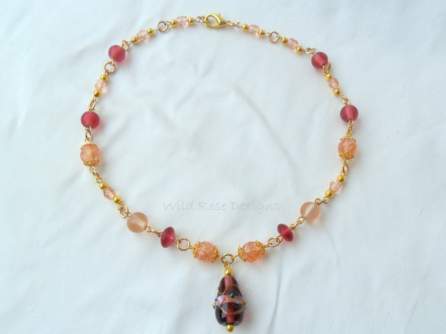 Pink and gold beaded necklace 