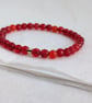 Red-orange faceted agate gemstone stretch bracelet  - Image 7