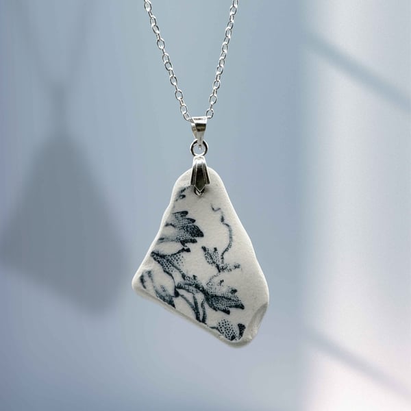 Sea pottery necklace. Blue floral design.