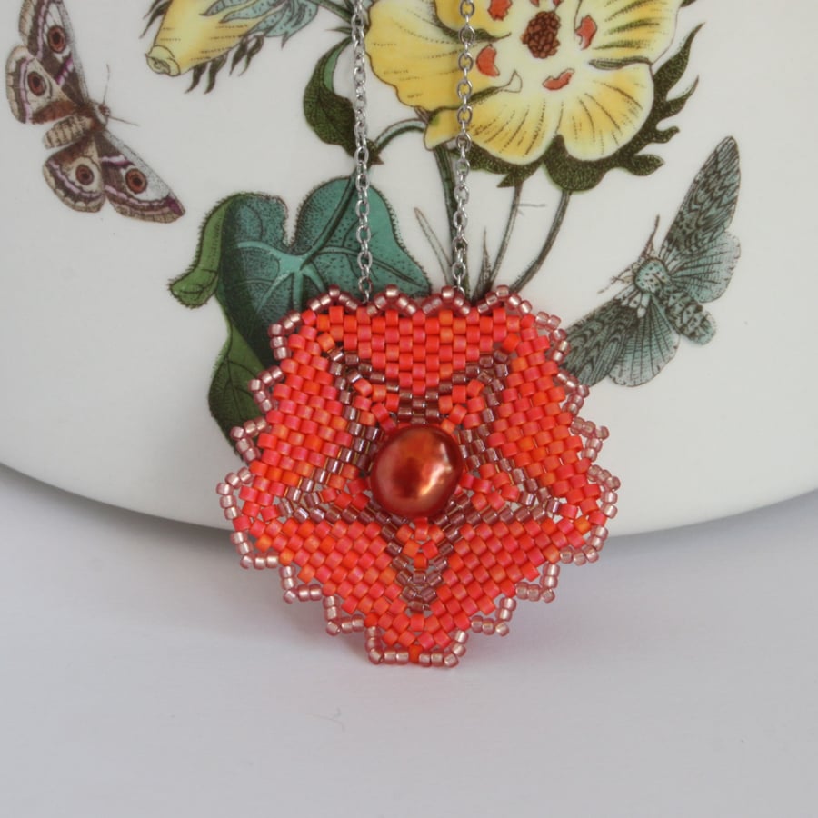 Tudor rose inspired pentagon pendant in a bright pinky orange