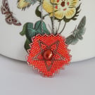 Tudor rose inspired pentagon pendant in a bright pinky orange