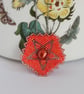 Tudor rose inspired pentagon pendant in a bright pinky orange