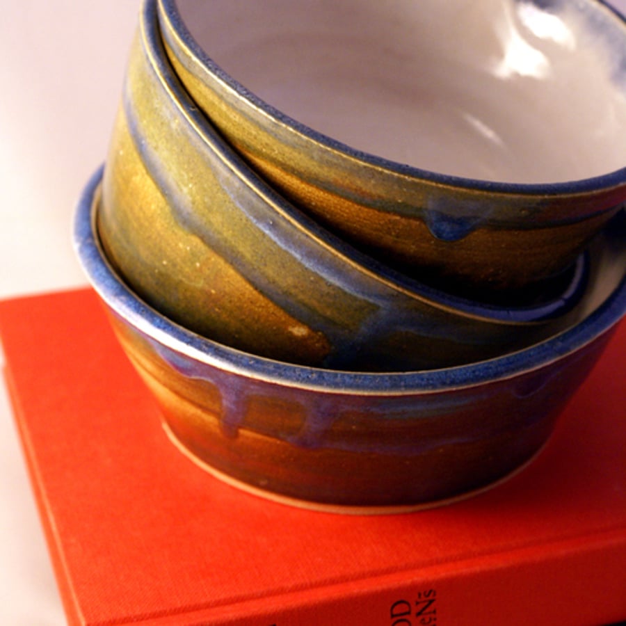 Set of three hand thrown ceramic bowls - glazed in brown, blue and white
