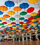 Colourful Umbrellas Torrox Costa Del Sol Spain Photograph Print - Image 1