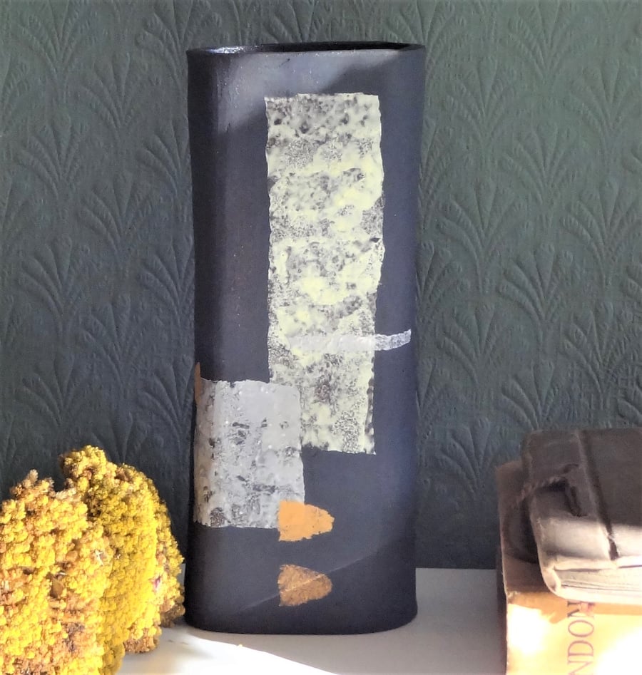 Black ceramic rectangular vase with abstract motifs hand made and decorated.