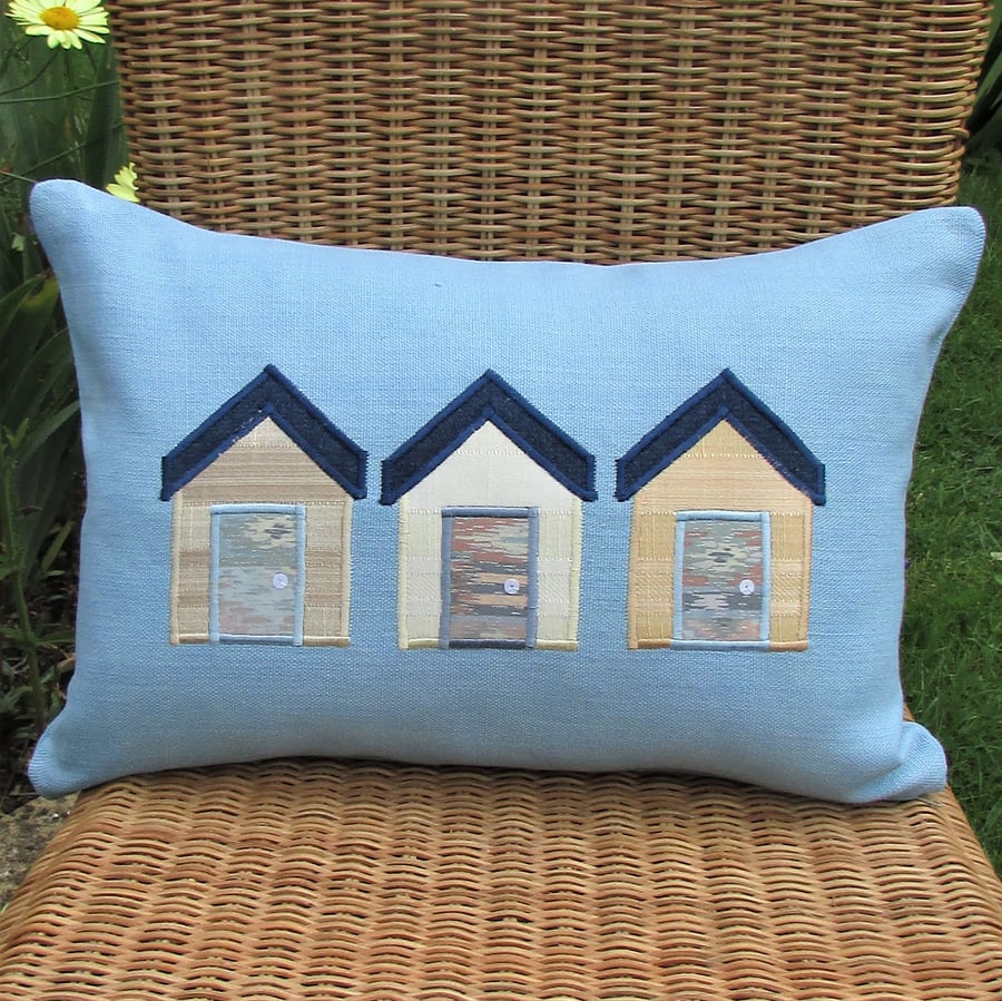 Beach huts cushion - Rectangular, blue with cream, beige and gold huts