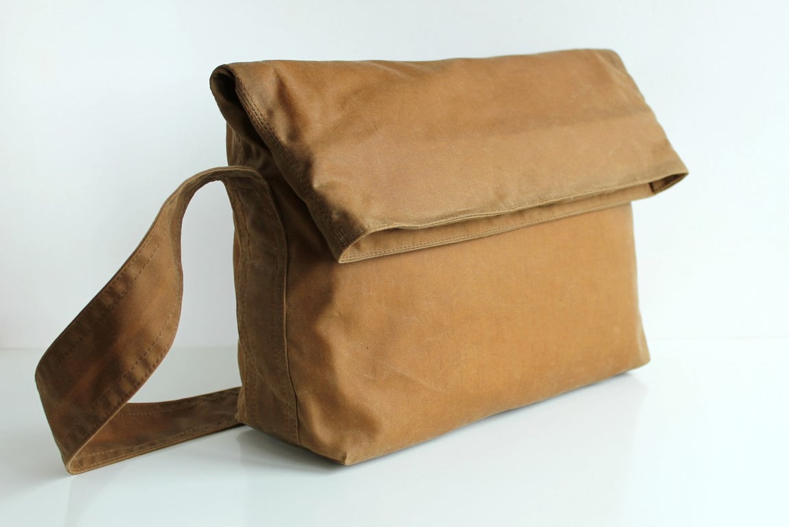 Minimal fold top bag in sand waxed canvas by Minus