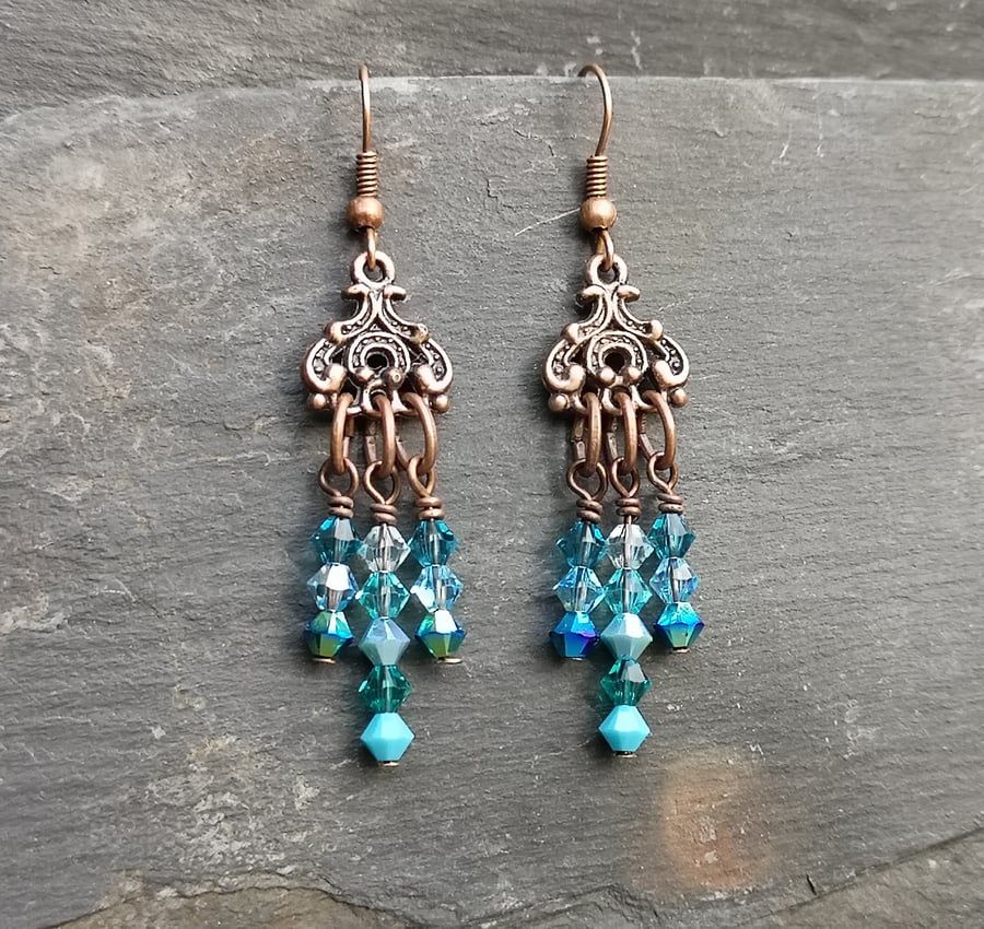 Swarovski crystal dangly earrings, copper and mixed blues