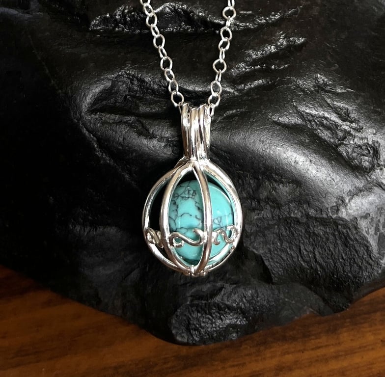 Sterling Silver Cage Pendant Containing Gemstone With Chain