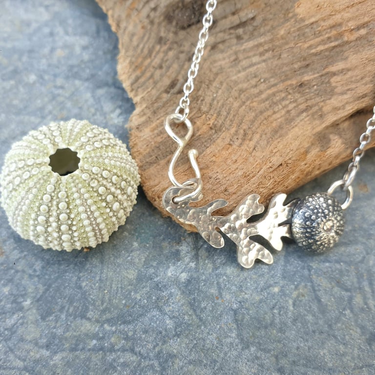 Silver sea urchin and seaweed pendant