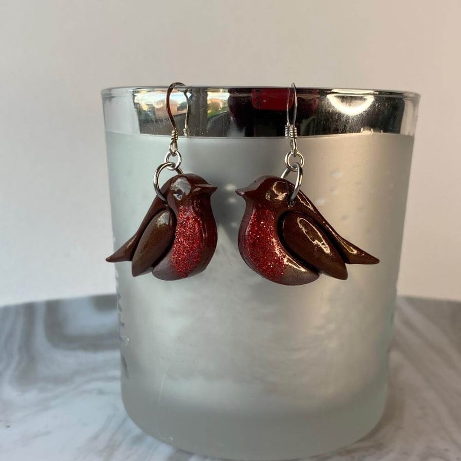 Robin earrings with red glitter polymer clay and resin on sterling silver.