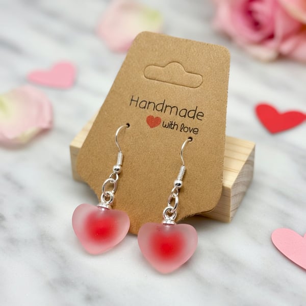 Add a soft romantic touch to your look sweet heart earrings. 