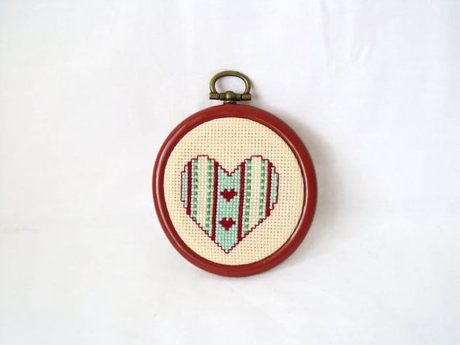 small embroidered heart art wall hanging, just under 3 inches
