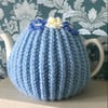 Hand Knitted Warm Aran Tea Cosy with crocheted Flowers