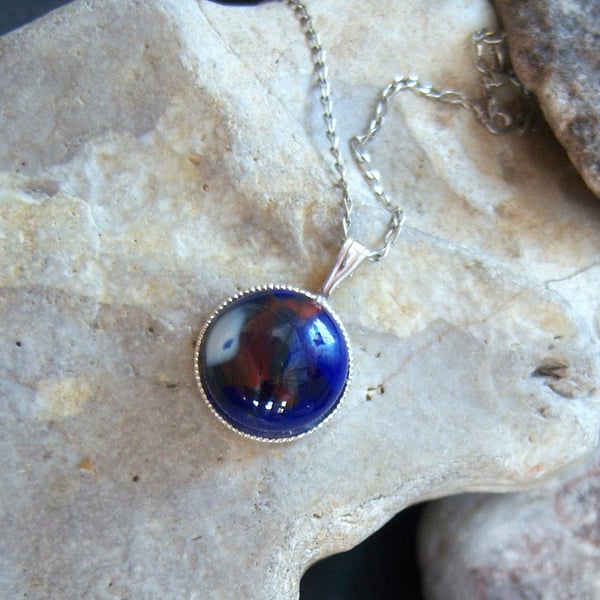 dark blue glass pendant in sterling silver