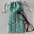 Glasses case, sunglasses pouch, padded, with drawstring,  in green floral cotton