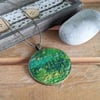 Felted pendant - greens, hint of yellow in a bronze bezel