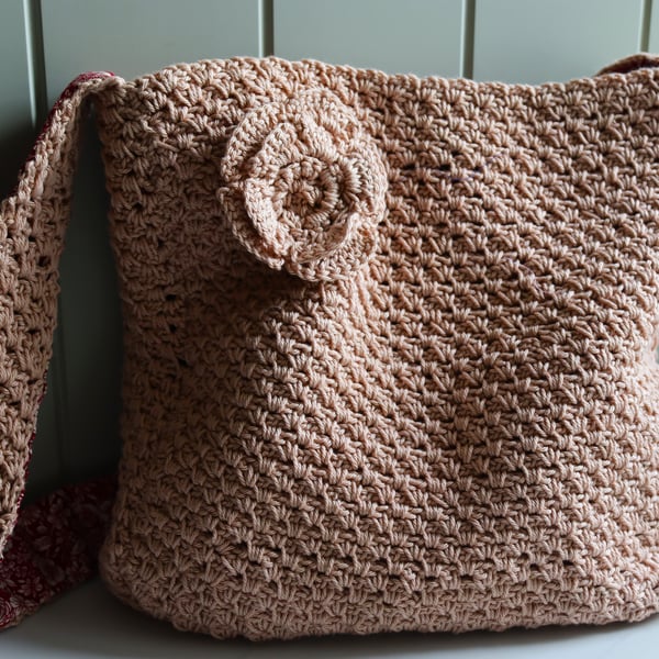 Crochet caramel coloured shoulder bag with flower decoration