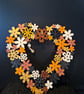 Decorative wooden flower wreath.  - Image 1