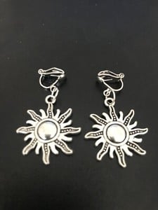 clip on earrings with sun  tibetan silver charm